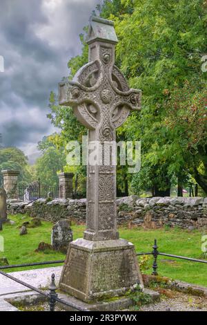 Croce celtica, Glendalough, Irlanda Foto Stock