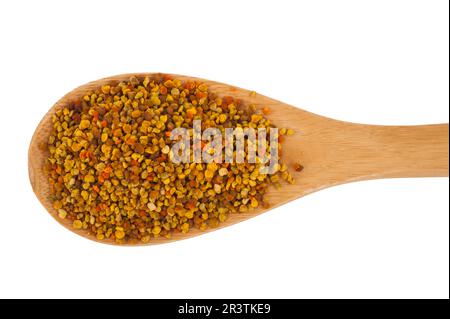 Polline d'ape con cucchiaio di legno Foto Stock