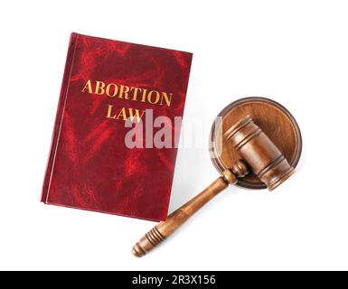 Abortire Law libro e Gavel su sfondo bianco, vista dall'alto Foto Stock