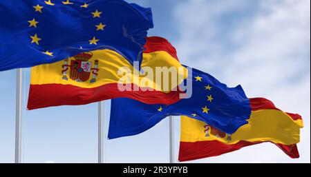 Le bandiere della Spagna e dell'Unione europea sventolano al vento in una giornata di sole. Democrazia e politica. Stato membro dell'Unione europea. 3d illustrazione rend Foto Stock