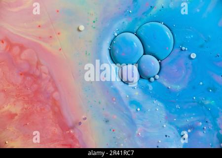 Celle di olio blu e viola in rosso colorato e giallo cosmico fantasy spazio sfondo arte Foto Stock