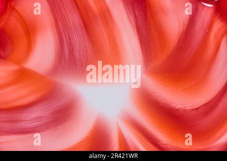 Risorsa astratta di fondo di caramelle di zucchero in prisma colorato acquerello di rosso e arancione e marrone e rosa Foto Stock