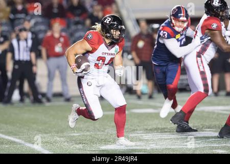 Ottawa, Canada. 26th maggio, 2023. Ottawa Redblacks ante Milanovic-Litre (34) corre con la palla durante il gioco di preason CFL tra Montreal Alouettes e Ottawa Redblacks tenutosi al TD Place Stadium di Ottawa, Canada. Daniel Lea/CSM/Alamy Live News Foto Stock