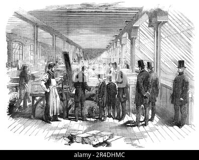 Visita del Principe di Galles e del Principe Alfred all'istituzione litografica del Messrs Day and Son, [Londra], 1856. Visita reale al laboratorio di stampa dei litografi alla Regina, '...in per ispezionare i vari processi dell'arte della litografia dall'inizio alla fine sotto forma di impronte dalla mano della stampante; e più in particolare con l'obiettivo di vedere il progresso delle molte opere importanti in cromolitografia che oggi sono prodotte da questa eminente azienda. Al loro arrivo i giovani principi sono stati ricevuti dal Sig. Day, che ha esposto loro severa Foto Stock