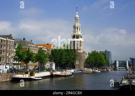 Torre, Montelbaanstoren, Oudeschansgracht, Amsterdam, Paesi Bassi Foto Stock