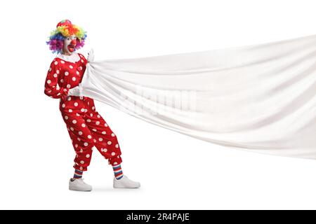 Clown tirando un grande panno bianco isolato su sfondo bianco Foto Stock