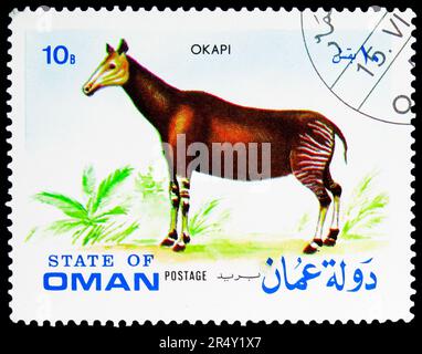 MOSCA, RUSSIA - 18 MAGGIO 2023: Francobollo stampato in Oman mostra Okapi (Okapia johnstoni), serie, circa 1972 Foto Stock