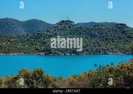 Vista del castello e della baia di Simena, Via Licia, Kaleköy, Turchia Foto Stock