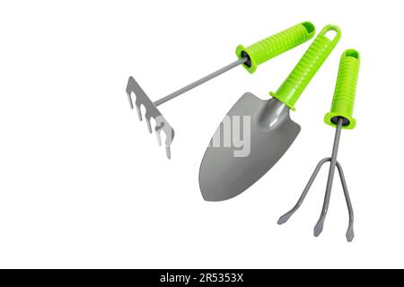 Pala da giardino, rastrello e forchetta isolati su sfondo bianco. Attrezzi da giardino Foto Stock