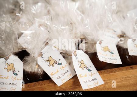 Grazie per aver scelto di ricevere i gadget. Winnie the Pooh party merchandise. Winnie the Pooh tema compleanno goodie borse. Festa di compleanno dei ragazzi. Foto Stock