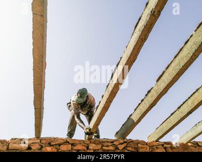 Mauritania, regione di Adrar, Entkemkemt, lavoratore Foto Stock