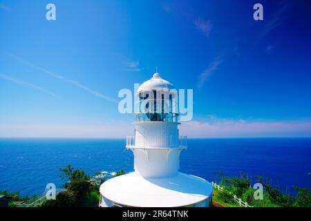 Faro di Capo Murato e barca Foto Stock