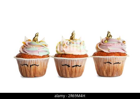 Tortini dolci e carini di unicorno isolati su bianco Foto Stock