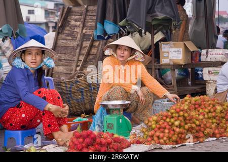 Fornitore di mercato, mercato, Cai Be, Delta del Mekong, Vietnam Foto Stock