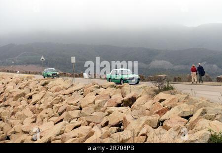 Green Taxi (New Territories taxi) sulla diga Ovest di High Island Reservoir nel Sai Kung East Country Park a Hong Kong. Foto Stock