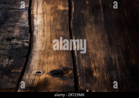 Vecchi pavimenti in legno con tracce di nero bruciato su sfondi astratti e texture. Foto Stock