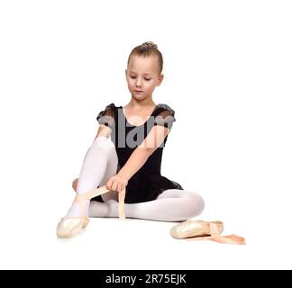 Little Ballerina in nero tutu indossa scarpe da ballo Foto Stock