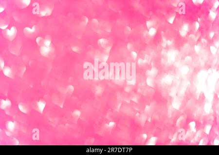 Rosa delicato sfondo bokeh astratto. Sfondo con bokeh e hearts.bloosed San Valentino cuore a forma di sfondo luci Foto Stock