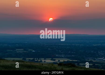 Una vista del tramonto da Ditchling Beacon nelle South Downs Foto Stock