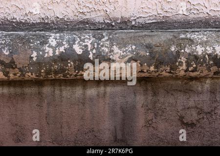 vecchio grigio grungy blu rosso giallo struttura cemento muro di pietra sfondo Foto Stock