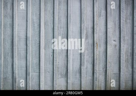 Rustico grigio verticale legno tavola parete sfondo Foto Stock