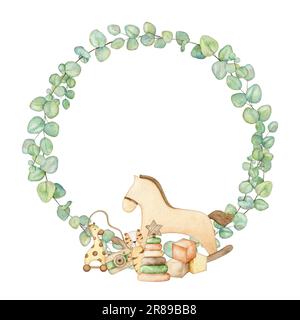 Telaio doccia bambino con giocattoli piramide in legno, macchina fotografica, cavallo a dondolo, cubi, tigre di peluche, giraffa su ruote, giocattolo da dentizione in corona di eucalipto. Mano Foto Stock