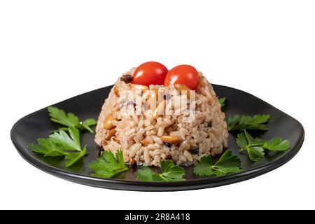 Riso con pistacchi di pino e mandorle isolate su fondo bianco. Bademli ic pilavı. Varietà di antipasti. Ramadan cibo Foto Stock