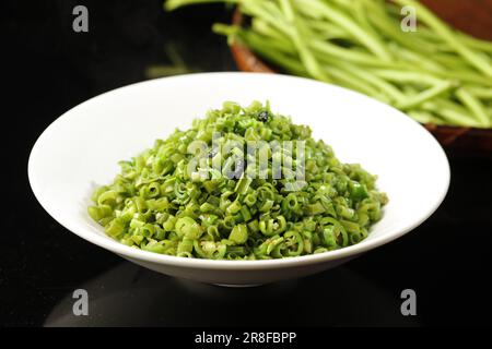 Mescolare spinaci d'acqua fritti, gloria mattutina cinese Foto Stock