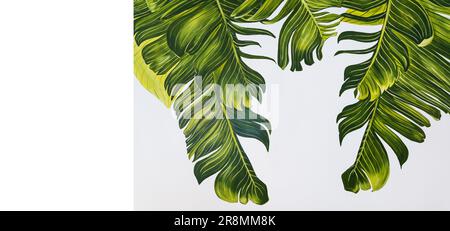 Le foglie di palma tropicali sono splendidamente dipinte con vernice acrilica in diverse sfumature di verde. Spazio per un'iscrizione Foto Stock