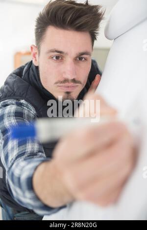 office man scrivere note su blocchi note Foto Stock