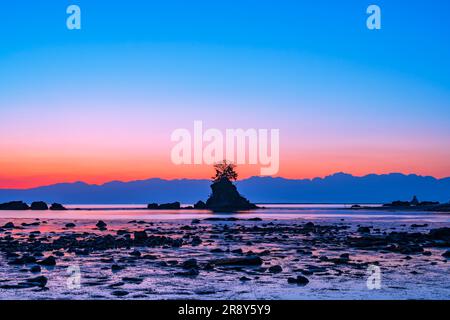 Alba sulla costa di Amehare Foto Stock