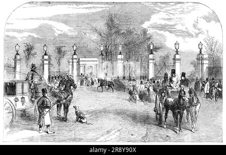 New Buckingham-Gate, St. James's Park, [Londra], 1857. Vista di "...il nuovo Lodge e Buckingham Gate...il Park Lodge, che si trovava tra il capolinea della strada che passa di fronte alla Wellington Barracks e che attraverso il parco è stato rimosso; Allo stesso modo, sono state erette le porte singole, e al loro posto bellissime porte doppie, due per ogni ingresso, ed è stata costruita una nuova loggia... il nostro artista ha fatto la sua illustrazione con la vita e il trambusto della piena marea della stagione. Lo stile dei cancelli è buono, e i pilastri in pietra e i cancelli in ghisa sono decisamente un miglioramento u Foto Stock