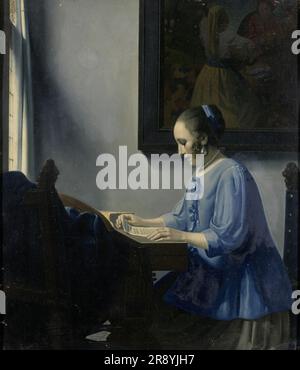 Donna che legge musica, 1935-1940. Pittura ispirata a "Woman in Blue Reading a Letter" di Vermeer. Henricus Antonius van Meegeren fu un pittore e ritrattista olandese, considerato uno dei più ingegnosi falsari d'arte del XX secolo. Divenne un eroe nazionale dopo la seconda guerra mondiale quando fu rivelato che aveva venduto un dipinto forgiato a Reichsmarschall Hermann G&#xf6;ring durante l'occupazione nazista dei Paesi Bassi. Foto Stock