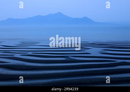 Appartamenti di fango sulla costa di Mikoshiorai Foto Stock