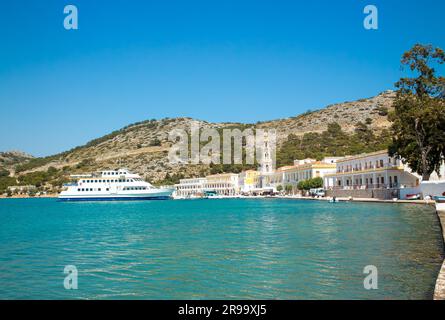 Symi, nota anche come Syme o Simi, è un'isola greca, una delle isole del Dodecaneso. Sacro Monastero del Tassiarca Michele Panormitis. Foto Stock