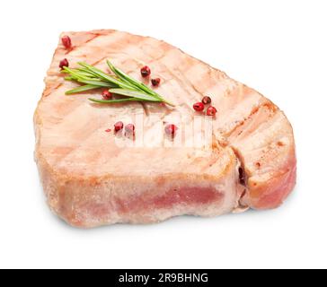 Deliziosa bistecca di tonno con rosmarino e spezie isolate su bianco Foto Stock