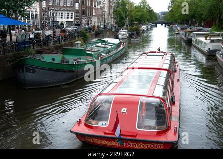 Tour in barca Hop-On Hop-Off sul canale Prinsengracht Foto Stock