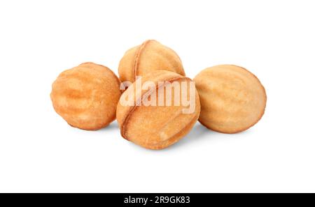 Deliziosi biscotti a forma di noce con latte condensato su sfondo bianco Foto Stock