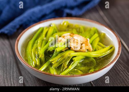 Baroni di citrina Hemerocallis stufato in brodo di pollo，Jin Zhen Cai, DAYLILY Golden Flower Buds Huang Hua Cai Foto Stock