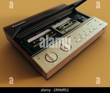 Rappresentazione 3D di una segreteria telefonica Panasonic vintage anni '80 su sfondo giallo senape - 7 giugno 2023 a Bristol, Regno Unito Foto Stock