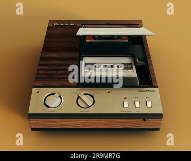 Rappresentazione 3D di una segreteria telefonica Panasonic vintage anni '80 su sfondo giallo senape - 7 giugno 2023 a Bristol, Regno Unito Foto Stock