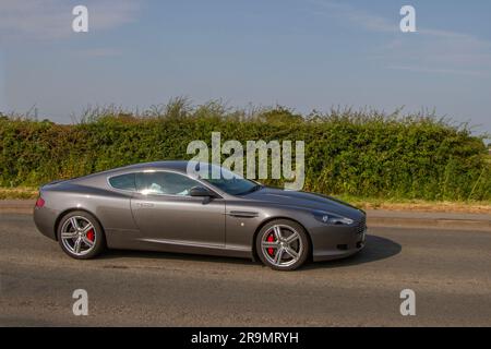 2009 Aston Martin DB9 V12 Auto 470 Touchtronic Auto Silver Car Coupe benzina 5935 cc Classic & Performance Motor Show presso Hoghton Tower; Supercar Showtime giugno 2023 Foto Stock