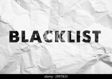 Black Word Blacklist su white paper crumpled Foto Stock