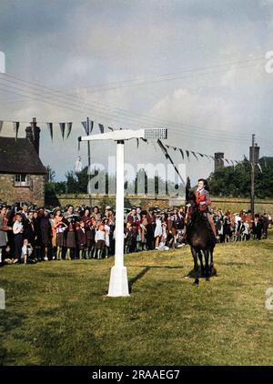 Nel Medioevo il QUINTAIN era un'attrazione popolare sul verde del villaggio, questo a Offham, nel Kent, è l'ultimo sopravvissuto in Inghilterra. Data: Medievale Foto Stock