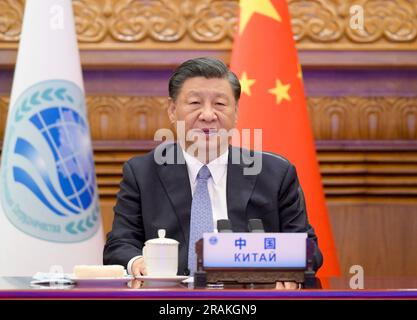 Pechino, Cina. 4 luglio 2023. Il presidente cinese Xi Jinping si rivolge alla 23a riunione del Consiglio dei Capi di Stato dell'Organizzazione di cooperazione di Shanghai (SCO) tramite videoconferenza da Pechino, capitale della Cina, il 4 luglio 2023. Crediti: Li Xueren/Xinhua/Alamy Live News Foto Stock