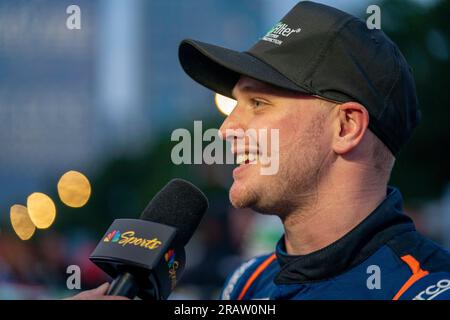 Chicago, Illinois, USA. 2 luglio 2023. JUSTIN HALEY (31), pilota della NASCAR Cup, sfugge alla pioggia per l'inaugurale Grant Park 220 sul Chicago Street Course. (Immagine di credito: © Logan T Arce/ASP via ZUMA Press Wire) SOLO USO EDITORIALE! Non per USO commerciale! Foto Stock