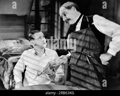 Herbert Marshall (a sinistra), sul set del film, 'Evenings for sale', Paramount Pictures, 1932 Foto Stock