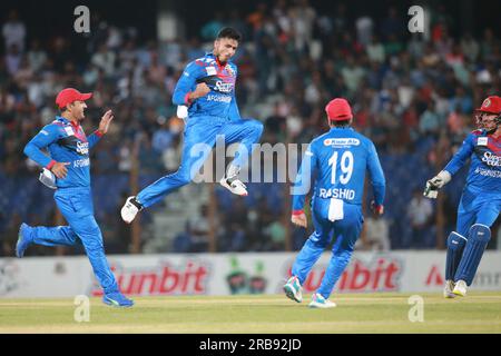 Il lanciatore afghano Mujeeb Ur Rahman festeggia dopo aver fatto il wicket di nazmul Hasan Shanto durante il secondo giorno internazionale del Bangladesh-Afghanistan (o Foto Stock