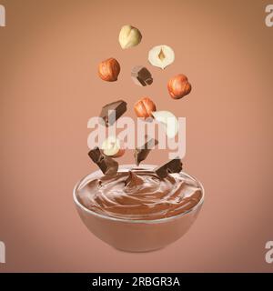 Preparare una deliziosa pasta al cioccolato. Nocciole e pezzi di cioccolato che cadono in un recipiente su sfondo marrone chiaro Foto Stock