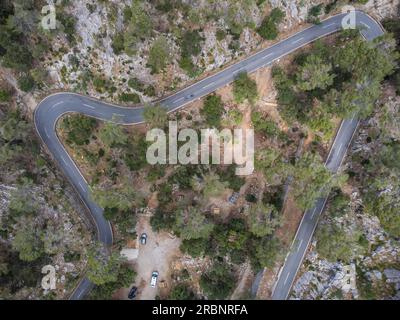 Ciclisti in salita sulla strada lluc, Maiorca, Isole Baleari, Spagna. Foto Stock